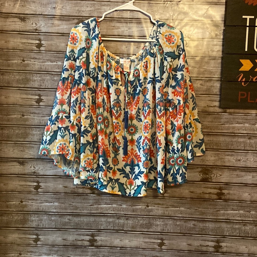 Flying tomato top